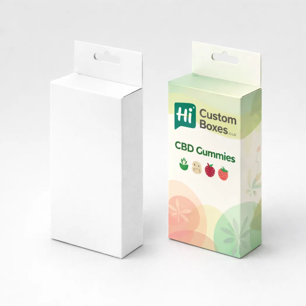 A pair of premium white gift boxes with lids- one plain and one featuring orange branding- class=